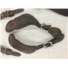 Image 7 : Five Pairs of Spur Straps and a Pommel Bag