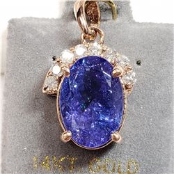 29) 14 KARAT ROSE GOLD TANZANITE & DIAMOND PENDANT