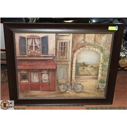 FRAMED PICTURE OF CAFÉ WITH BIKE.
