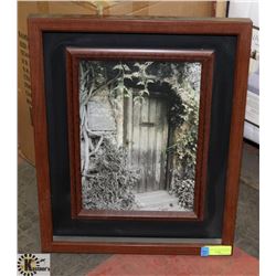 FRAMED PICTURE OF AN OLD DOOR.