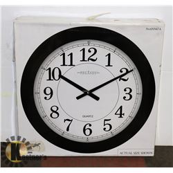 NEW IN BOX EXTRA LARGE WALL CLOCK.