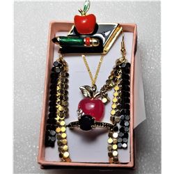 19)  GOLD TONE WITH RED, GREEN AND BLACK