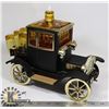 Image 1 : LIQUOR DECANTER IN A MUSIC BOX ANTIQUE CAR