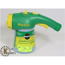 NEW MIRACLE GRO SPRAYER FULL OF PLANT FOOD