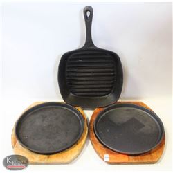 BAILIFF SEIZURE TWO 10" CAST IRON PLATES W/ WOOD