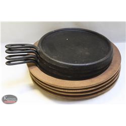 LOT OF 4 CAST IRON ROUND GRIDDLE W/ WOODEN COASTER