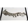 Image 1 : VINTAGE STERLING SILVER CHARM BRACELET LOADED