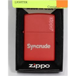 NEVER USED ZIPPO SYNCRUDE LIGHTER