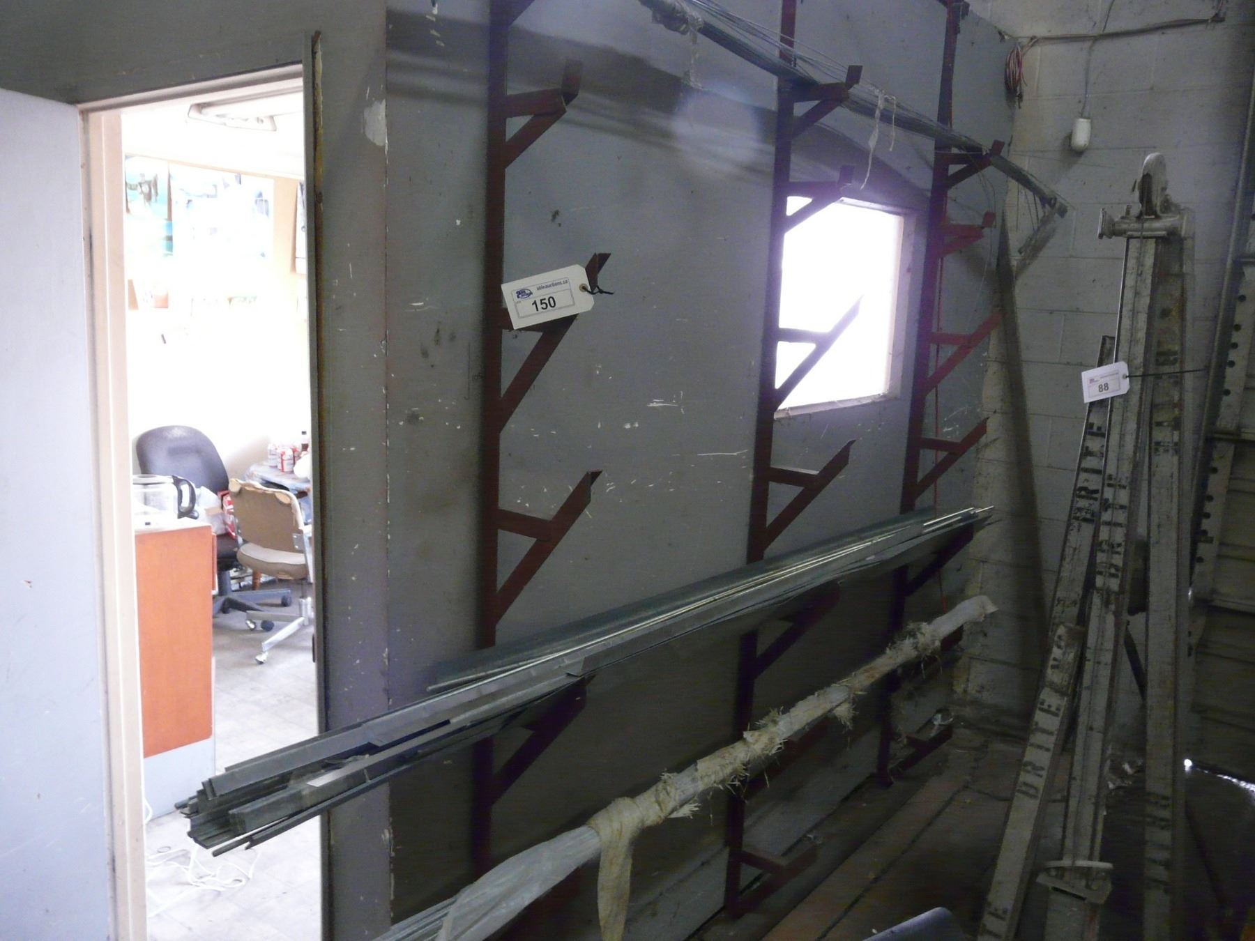 Redo Rod RACK WITH 3/8 REDI ROD AND CONTENTS - Able Auctions