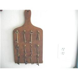 Bread Board with Twelve Hanging Old Keys #896407