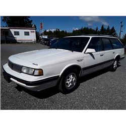 B2 --  1989 OLDSMOBILE CUTLASS CRUISER SL , White , 101122  KM's
