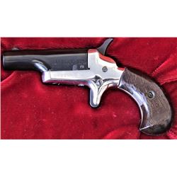 Cased Colt 4th model .22 short SN 55685D single shot derringer with 2 1/2" barrel, blued and nickel 