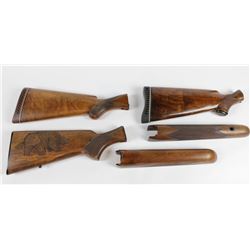 Collection of Browning stocks including 3 buttstocks and 2 forends.3 buttstocks and 2 forends.