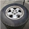 Image 2 : 4 MICHELIN 235/70R16 INCH TORES ON 5 BOLT JEEP RIMS