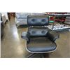 Image 8 : AS NEW EAMES STYLE BLACK LEATHER AND TEAK FINISH SWIVEL CHAIR AND OTTOMAN , RETAIL $1399
