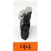 Image 1 : 2.7 Oz. Crystal with Hand Carved Skull Center