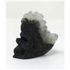 Image 2 : 2.7 Oz. Crystal with Hand Carved Skull Center