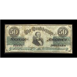 T16 $50 1861. This Jefferson Davis note has the script T16 $50 1861.