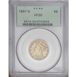 1867-S $5 VF20 PCGS. A subdued tan-gold example with a