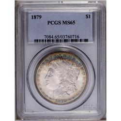 1879 S$1 MS65 PCGS. Satiny surfaces have considerable