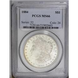 1884 S$1 MS66 PCGS. A veneer of champagne-gold color o