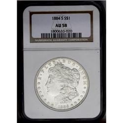 1884-S S$1 AU58 NGC. Sweeping luster is nearly complet