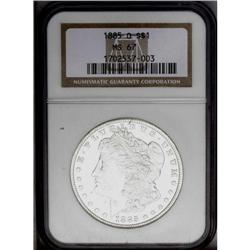 1885-O S$1 MS67 NGC. Silver-gray surfaces dispense a p