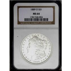 1889-O S$1 MS64 NGC. Silver-gray surfaces display plea
