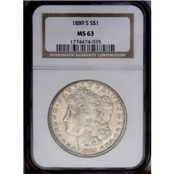 1889-S S$1 MS63 NGC. Soft luster peeks through light g
