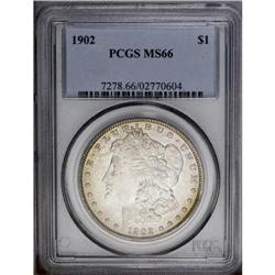 1902 S$1 MS66 PCGS. Light greenish-gold patina occupie