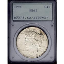1928 S$1 MS62 PCGS. Subdued luster with a patch of dar