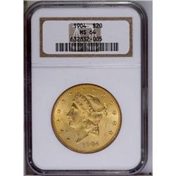 1904 $20 MS64 NGC. Subtle orange-gold and green-gold p