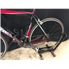 Image 2 : RED AND BLACK TREK 18 SPEED ROAD BIKE WITH HYBRID CLIP PEDALS, 79 CM STANDOVER HEIGHT