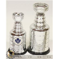 A PAIR OF MINI STANLEY CUPS, 1 IS MAPLE LEAFS