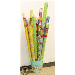 GARBAGE PAIL FULL OF NEW WRAPPING PAPER
