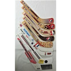 LOT 9 WOODEN + PLASTIC MINI HOCKEY STICKS