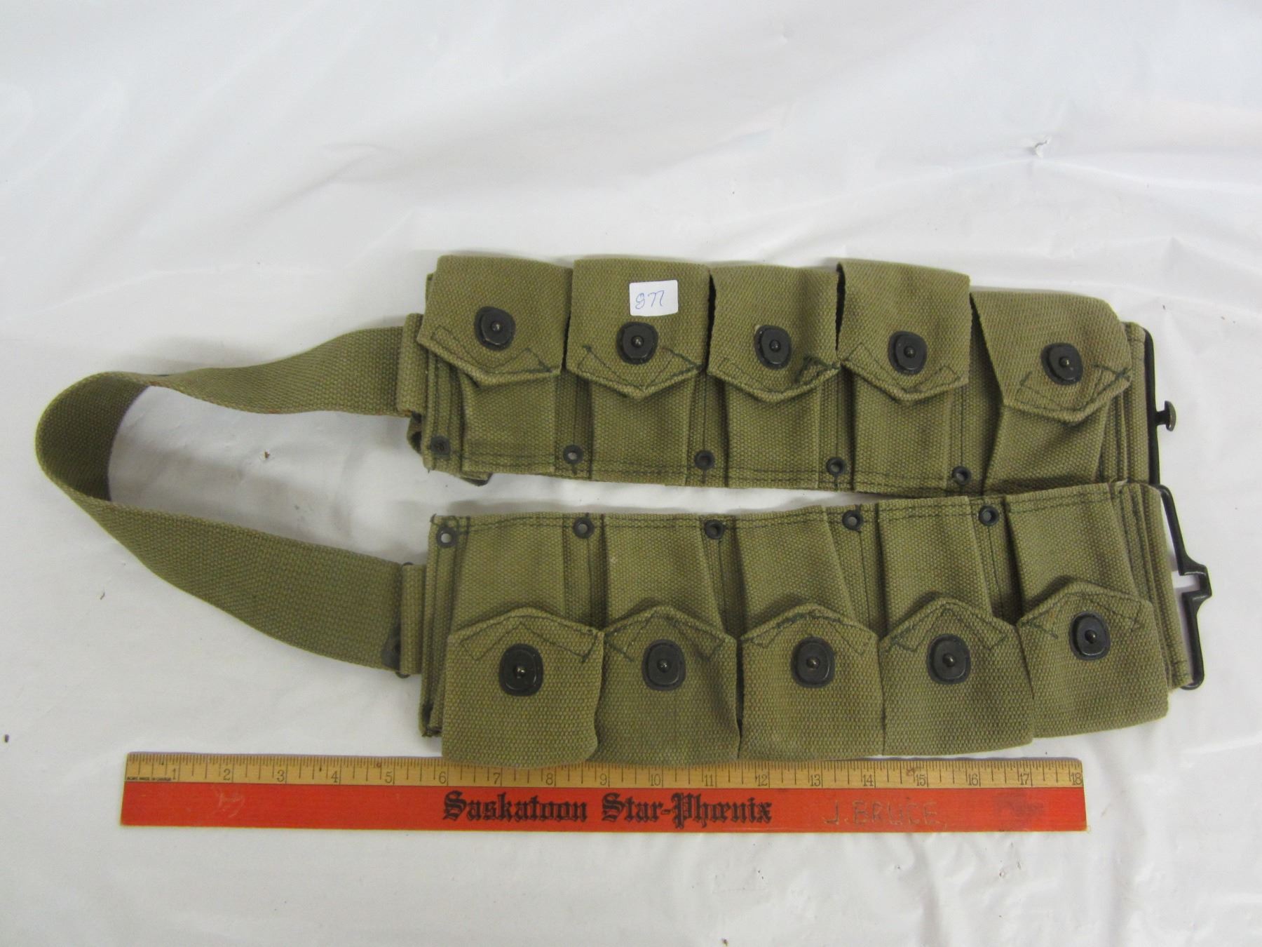 Green canvas military belt ammo pouches