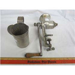 Vintage meat grinder and pint measuring cup