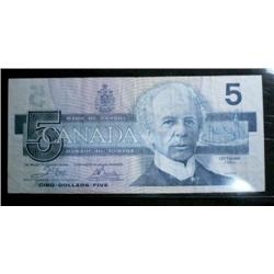 1986  $5  error note.  Minor offset. Th