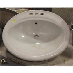 OVAL PORCELAIN DROP-IN BATHROOM SINK