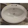 Image 1 : OVAL PORCELAIN DROP-IN BATHROOM SINK