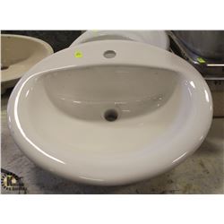 OVAL PORCELAIN DROP-IN BATHROOM SINK