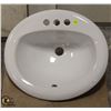 Image 1 : OVAL PORCELAIN DROP-IN BATHROOM SINK