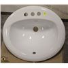 Image 1 : OVAL PORCELAIN DROP-IN BATHROOM SINK