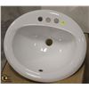 Image 1 : OVAL PORCELAIN DROP-IN BATHROOM SINK