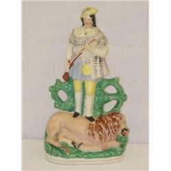 15 VICTORIAN STAFFORDSHIRE FIGURE-LION