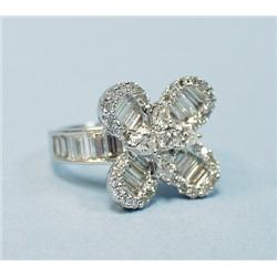 A custom made 18 kt. white gold and dia