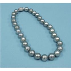 A gem quality silver grey cultured pear