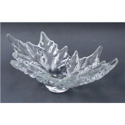 LALIQUE, FRANCE - A clear and frosted c