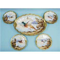 A set of eight antique French Limoges p